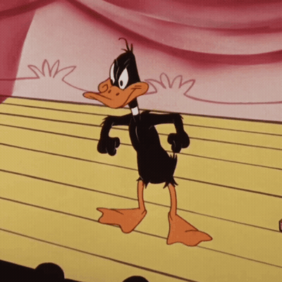 Cartoon Duck On Stage With Pink Curtain GIF