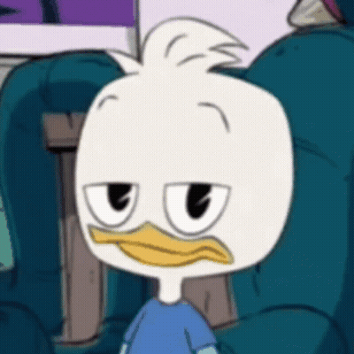 Cartoon Duck With Yellow Beak Sitting In Chair GIF