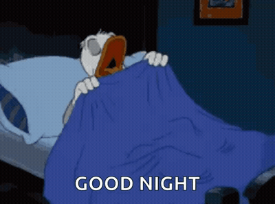Cartoon Duck Yawning In Bed GIF