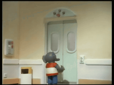 Cartoon Elephant In Front Of Door Number 33 GIF