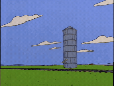 Cartoon Explosion With Flying Clock GIF