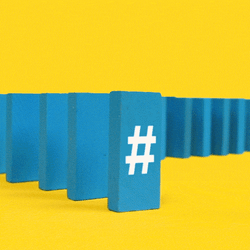 Cartoon Finger Topples Domino Hashtag Reveal GIF