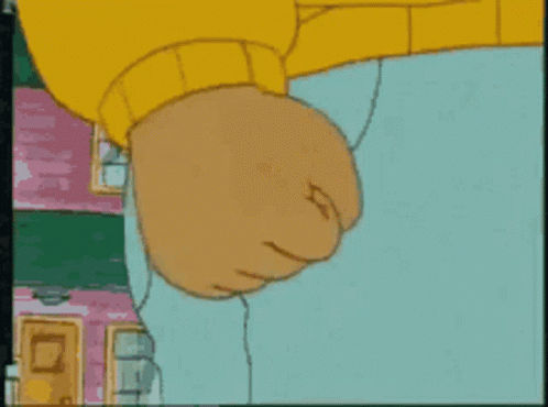 Cartoon Fist In Yellow Sweater GIF