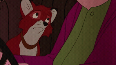 Cartoon Fox With Collar Beside Man GIF