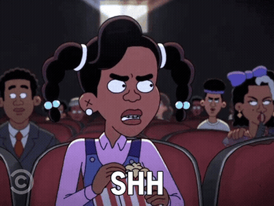 Cartoon Girl Holding Popcorn Saying Shh GIF