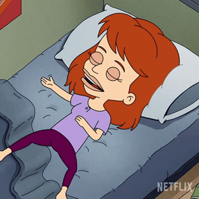 Cartoon Girl Laying On Bed With Netflix GIF