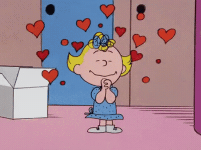 Cartoon Girl Surrounded By Hearts GIF