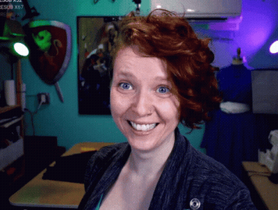 Cartoon Girl Waving At Arcade Machine GIF