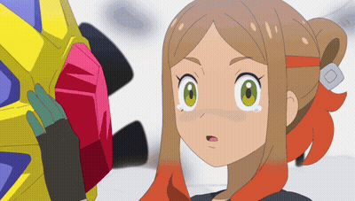 Cartoon Girl With Green Eyes Holding Red Object GIF