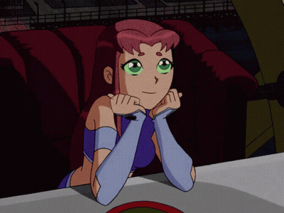 Cartoon Girl With Pink Hair And Green Eyes Sitting On Couch GIF