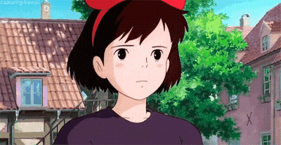 Cartoon Girl With Red Bow Standing In Front Of Building GIF