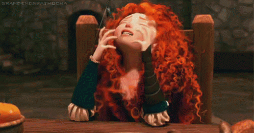 Cartoon Girl With Red Hair Sitting At Table GIF
