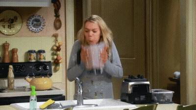 Cartoon Hand Holding Purple Object GIF