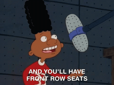 Cartoon Holding Microphone Saying And You'll Have Front Row Seats GIF