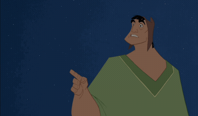 Cartoon In Green Shirt Pointing Up GIF