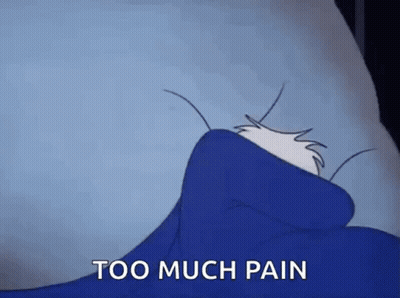 Cartoon Laying In Bed With Blue Blanket Saying Too Much Pain GIF