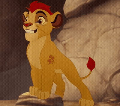Cartoon Lion Cub With Red Mane Standing On Rock GIF