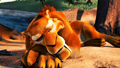 Cartoon Lion Laying Down With Eyes Closed And Sharp Claws GIF