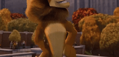 Cartoon Lion With Long Mane Standing In Park GIF
