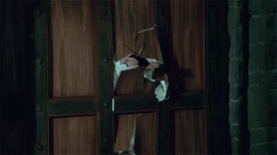 Cartoon Man Breaking Through Door GIF