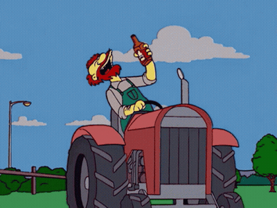 Cartoon Man Driving Tractor Holding Beer GIF