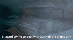 Cartoon Man Fighting Off Blizzard Meme GIF