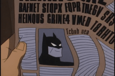 Cartoon Man Holding Newspaper With Batman GIF