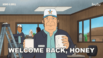 Cartoon Man Holding Two Cups Saying Welcome Back Honey GIF
