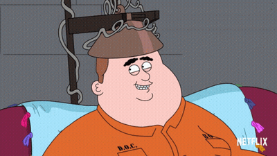Cartoon Man In Prison Uniform With D.O.C. Shirt GIF