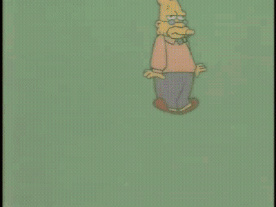 Cartoon Man Next To Pink Box With Heart GIF