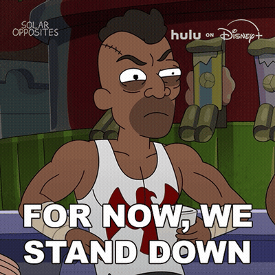 Cartoon Man Saying For Now We Stand Down GIF