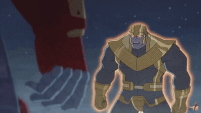 Hombre barbudo de dibujos animados sentado en una habitación GIF