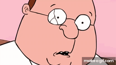 Cartoon Man With Glasses Sitting At Table GIF