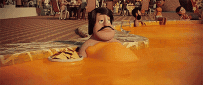 Cartoon Man With Mustache Sitting In Orange Liquid GIF