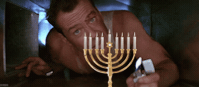 Cartoon Menorah With Lit Candles GIF