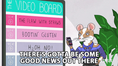 Cartoon Mouse Holding Cell Phone Next To Video Board GIF