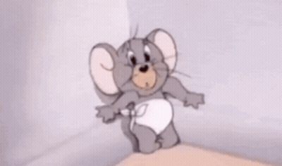 Cartoon Mouse In Diaper Standing On Table GIF