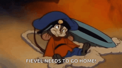 Cartoon Mouse Laying On Ground Saying Fievel Needs To Go Home GIF
