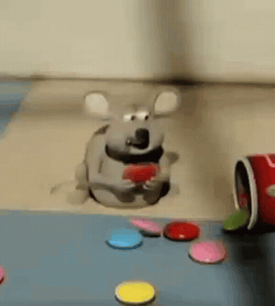 Cartoon Mouse Sitting In Hole Eating Red Heart GIF