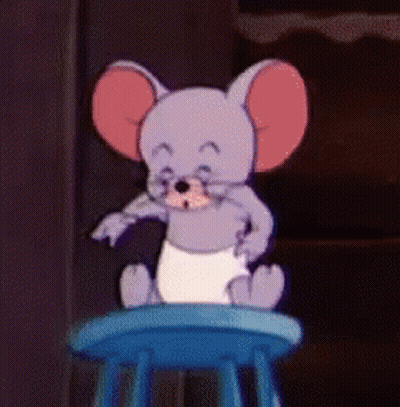 Cartoon Mouse Sitting On Blue Chair GIF