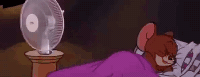 Cartoon Mouse Sleeping In Bed With Fan GIF