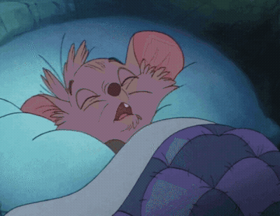 Cartoon Mouse Sleeping in Bed