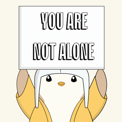 Cartoon Penguin Holding Sign Saying You Are Not Alone GIF