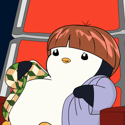 Cartoon Penguin In Chair With Scarf GIF