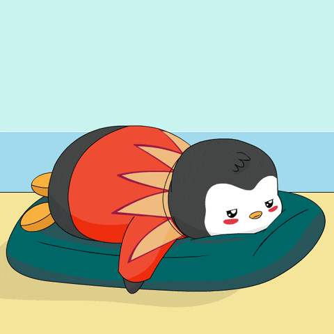 Cartoon Penguin Laying On Blue Pillow On Beach GIF