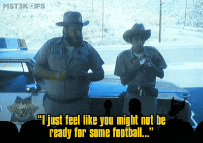 Cartoon Penguin Standing By Football GIF