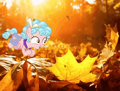 Cartoon Pony Laying On Autumn Leaves GIF