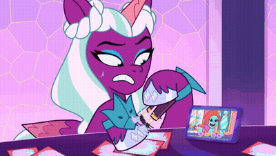 Cartoon Pony Sitting At Table With Cards And Phone GIF