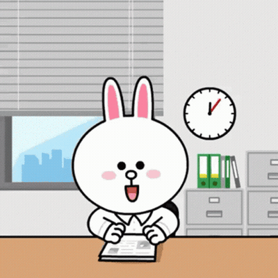 Cartoon Rabbit Sitting At Desk With Clock GIF