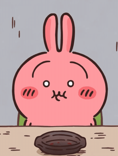 Cartoon Rabbit Sitting At Table With Empty Bowl GIF